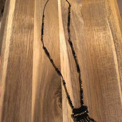 Necklace with gold and black beads like new
