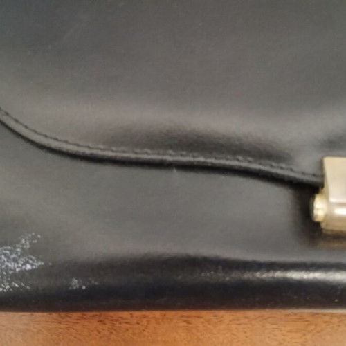 Envelope bag black genuine leather 14x28 cm used with plastic paint stain