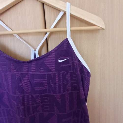 Nike tennis top like new, purple, with chest support size M