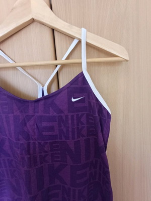 Nike tennis top like new, purple, with chest support size M