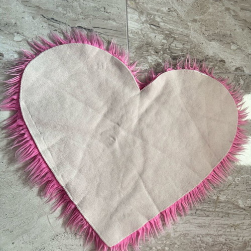 Heart-shaped fluffy rug like new