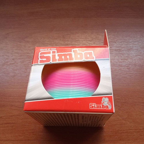 Collectible Slinky Simba spring toy 2000s new, sealed packaging