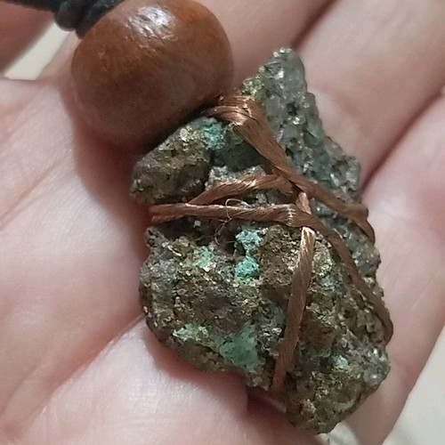 Pendant with pyrite new, gold copper wire and leather
