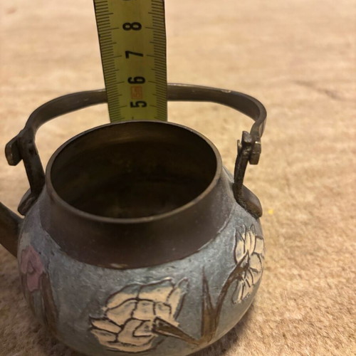 Handmade used brass decorative teapot with carved floral designs