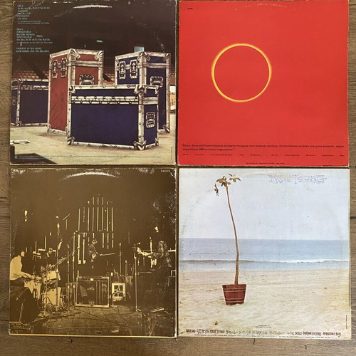 Neil Young 4 LP vinyl set like new, rock genre