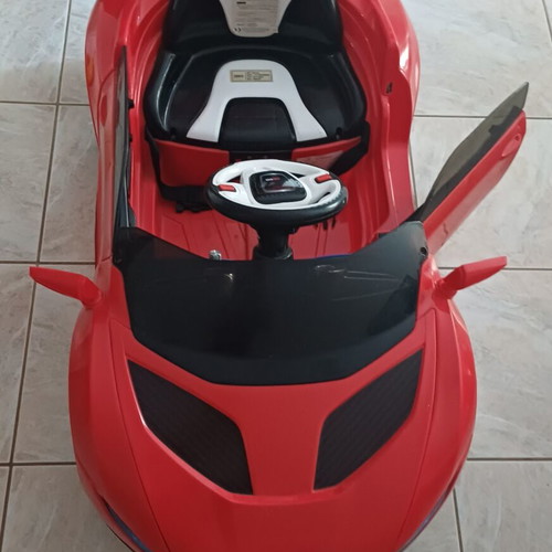 Electric children's car with light, music and remote control