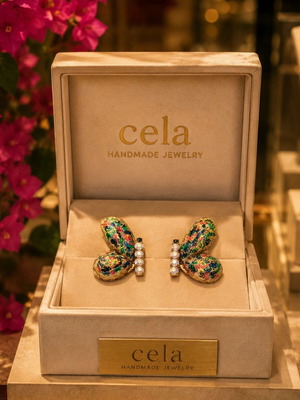 Handmade earrings made of polymer clay and liquid glass, hand-painted and with zirconia