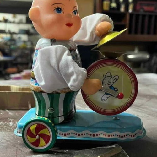 Vintage child beating drum from the 1960s new