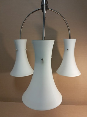 Pendant lamp used with three white opal shades