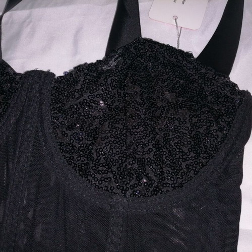 Women's black bustier corset top with sequins and sheer waist