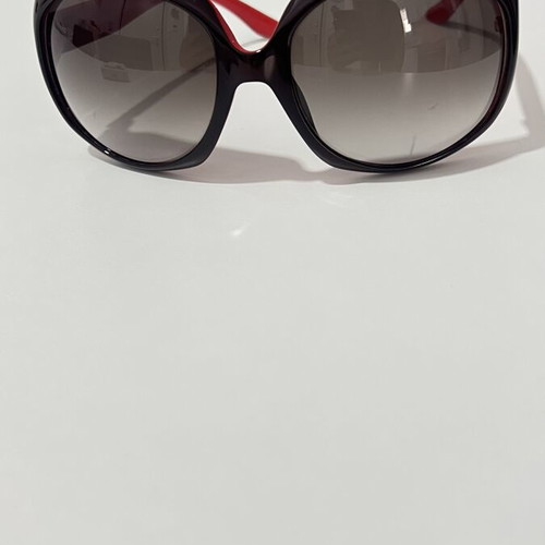 Christian Dior sunglasses used, black and red frame, lens scratched