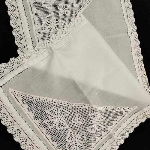 Handmade embroidered doily with crochet used