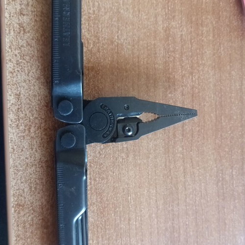 Leatherman Rebar Black Oxide multitool like new with case and box