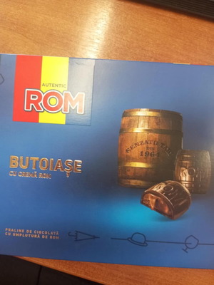 Collectible ROM chocolate box and Romanian Lei banknote