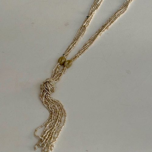 Handmade necklace used with small beads, beige
