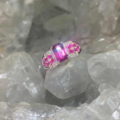 Silver ring with natural rhodolite garnet and moissanite