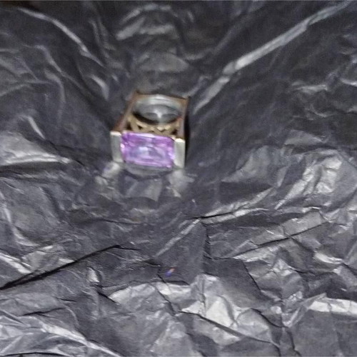 Silver geometric ring used with purple rectangular crystal