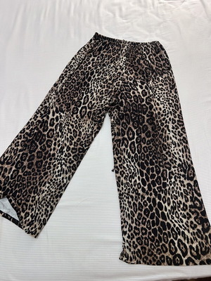Leopard print palazzo pants with elastic waist and drawstring