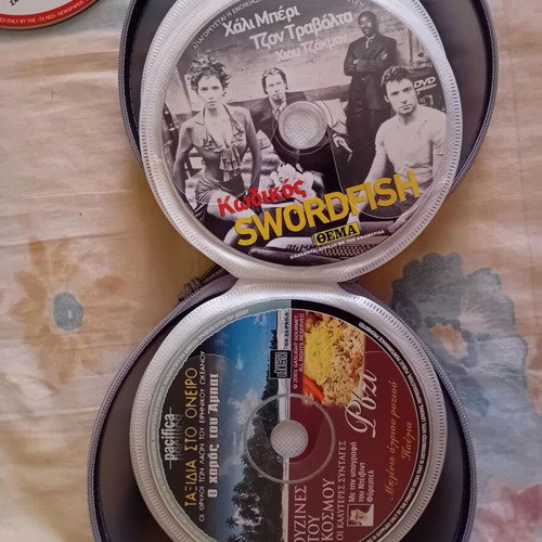 DVD collection like new, pack of 33 with movies, documentaries, and shows
