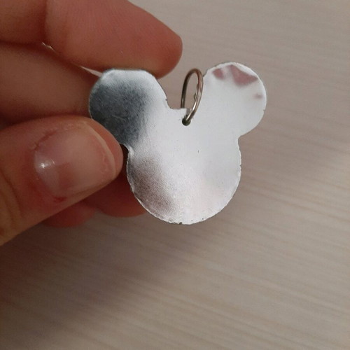 Micky Mouse pendant used with green diamonds