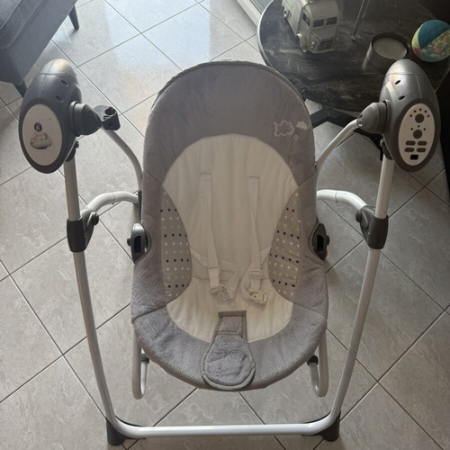 Baby relax swing with automatic rocking and sounds