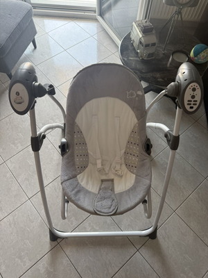 Baby relax swing with automatic rocking and sounds