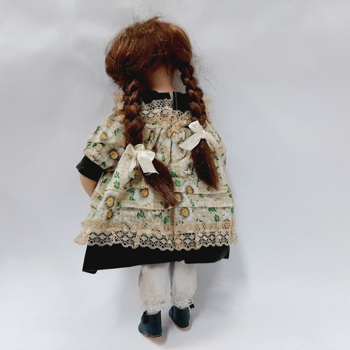 Vintage gardener doll with original outfit and watering can