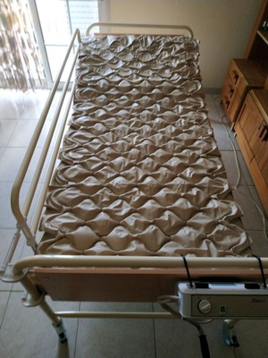 Hospital bed used with air mattress