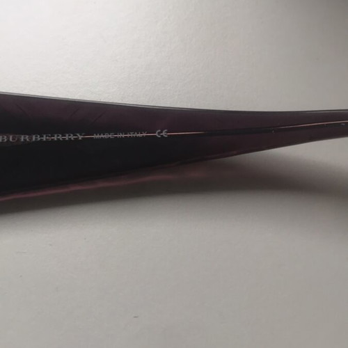 Burberry sunglasses and case used with minor defect