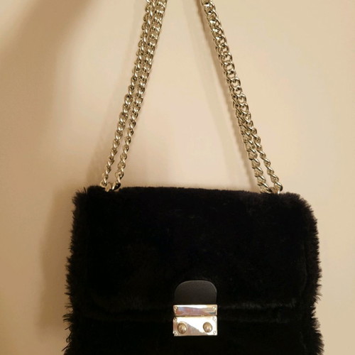 Fur shoulder bag new with leatherette and metal clasp