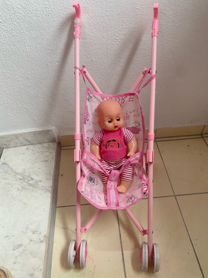 Doll stroller with doll used, pink