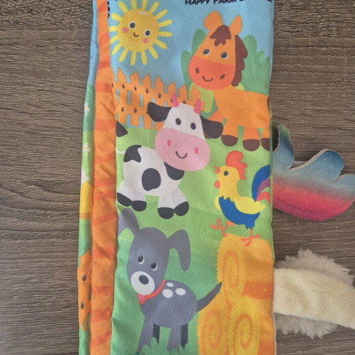 Fabric activity book with scratch sounds like new