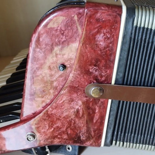 Vostok Accordion like new, red pearl vintage with case and books