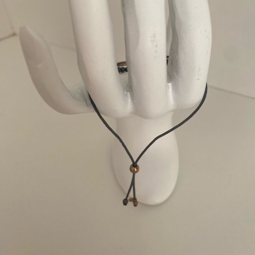 Gregio bracelet used, grey with rose gold charm