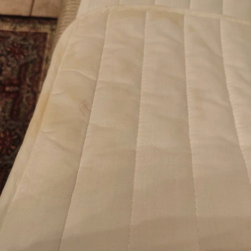 IKEA crib mattress pad used with stain
