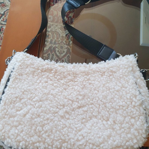 Fur crossbody bag in excellent condition with extra strap