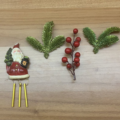 Santa Claus Christmas decoration set with bells and berries