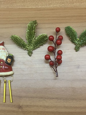 Santa Claus Christmas decoration set with bells and berries