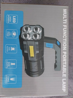 LED flashlight with USB charging, new