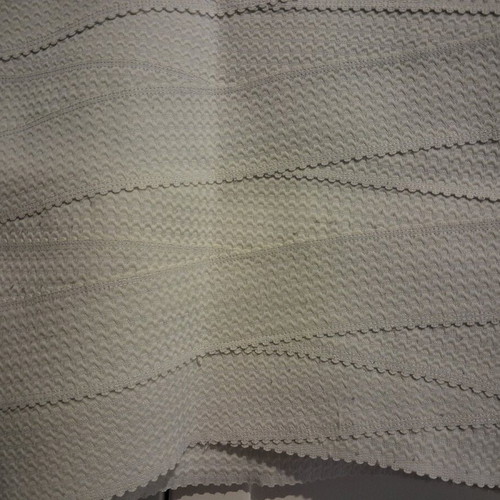Mini skirt H&M white small like new, embossed design