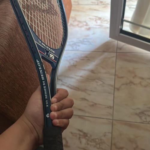 Dunlop X10 professional tennis racket with balls