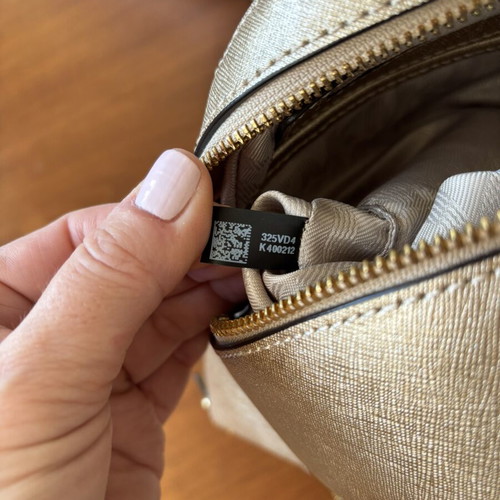 Michael Kors Rhea Medium backpack like new, gold