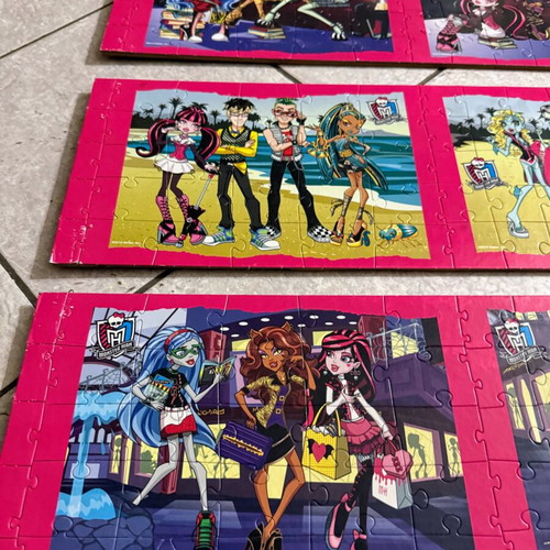 Monster High puzzle set like new, 9 glued on wood