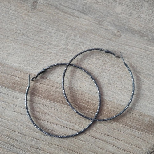 Large hoop earrings set 2 pairs like new, silver and black hammered