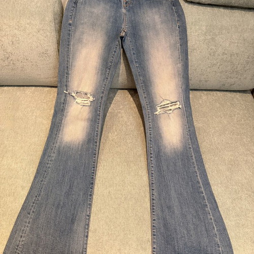 Fifty Carat jeans like new with knee rips size 28