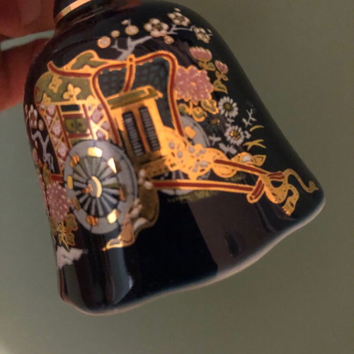 Porcelain bell with hand-painted design like new