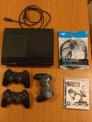 PS3 Super Slim 500GB console with three controllers and game