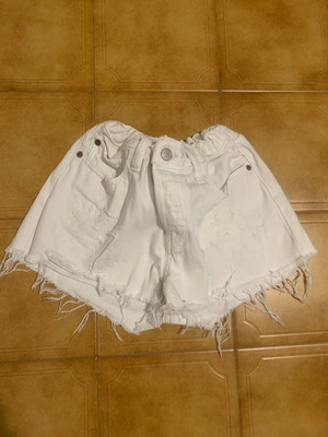 Women's denim shorts used, white, with frayed edges