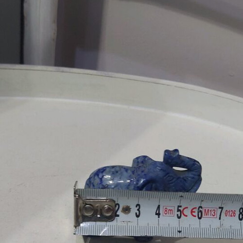 Decorative elephant carved from natural blue stone like new