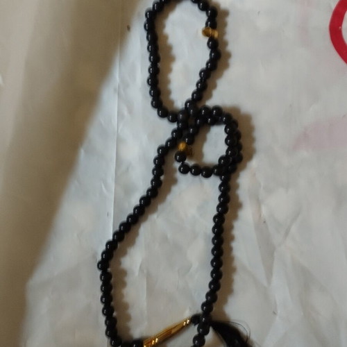 Okapi folding knife with rosary gift, like new